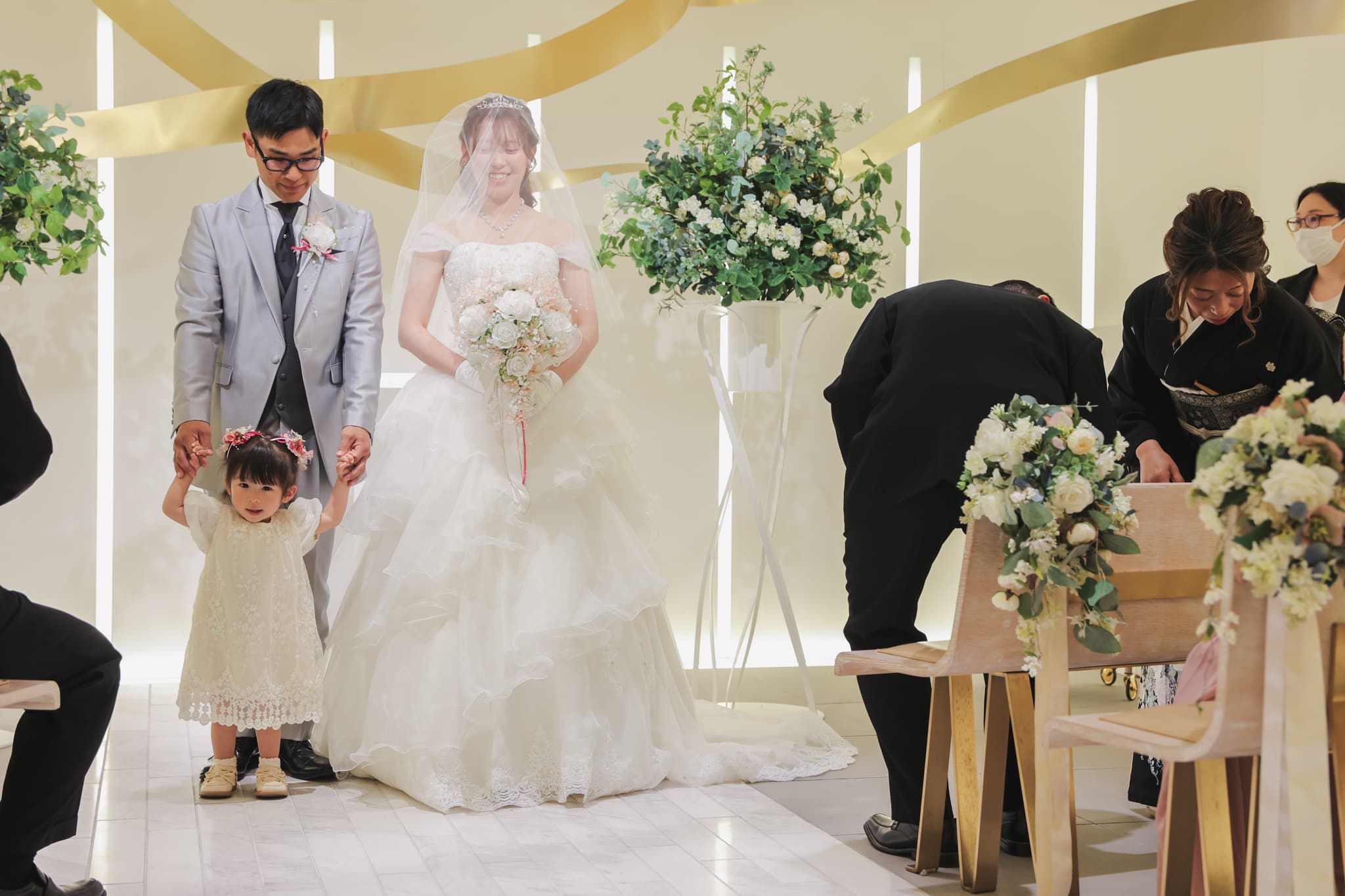 お子さまと一緒に迎えた、笑顔あふれる結婚式